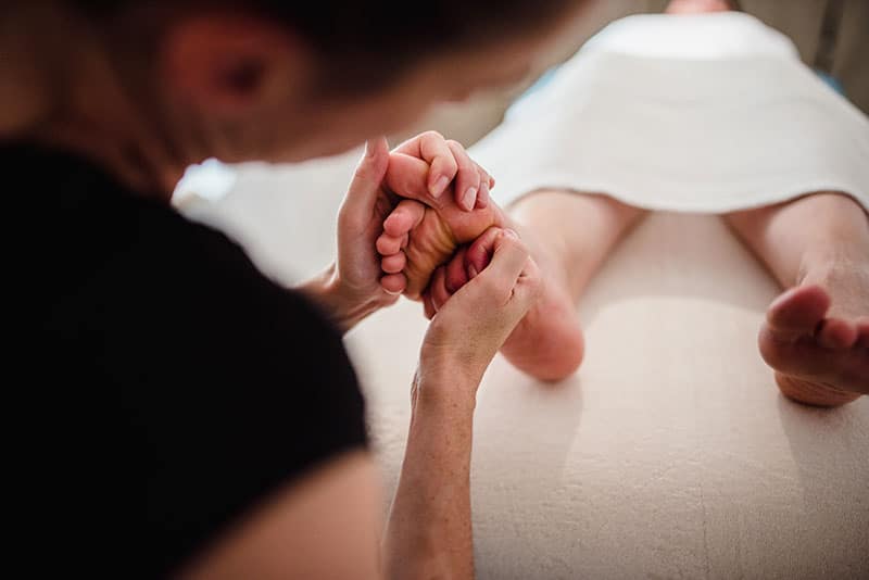 Massage des pieds et/ou jambes